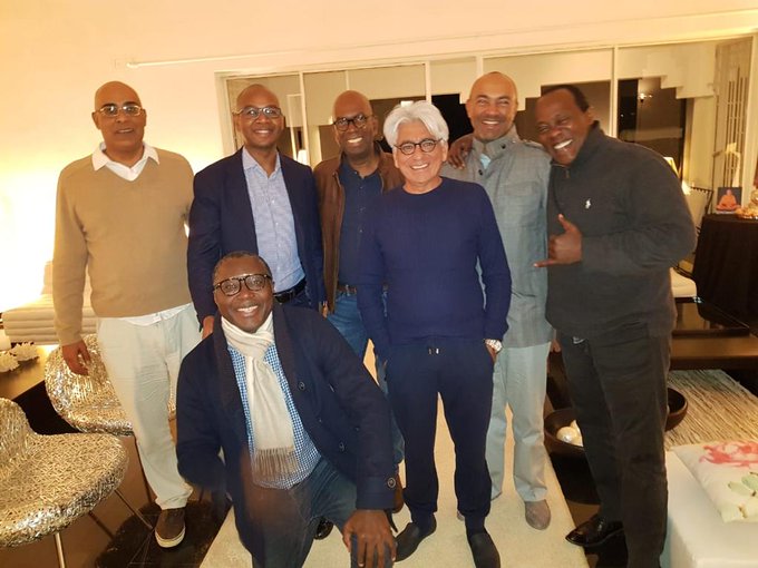 An image of the late Bob Collymore with members of his 'boys club'
