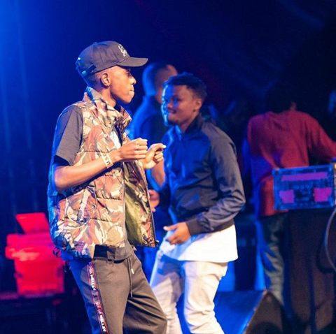 Kartelo on stage with Chipukeezy at a past event