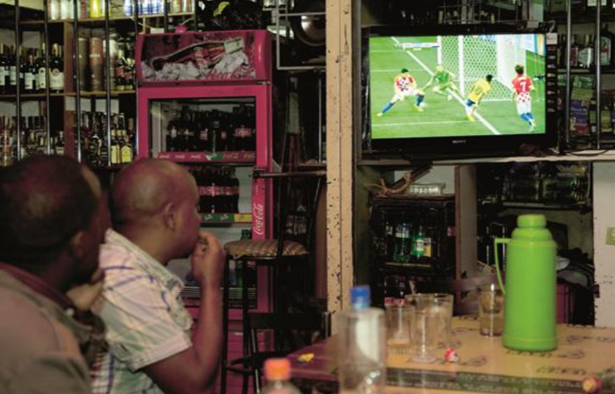 Fans watch football at a Nairobi bar